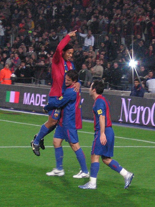 Ronaldinho avec Belletti et Giuly en décembre 2006